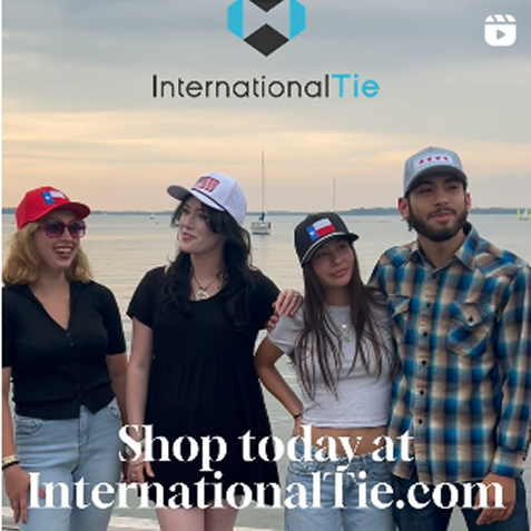 Two women wearing caps by the water